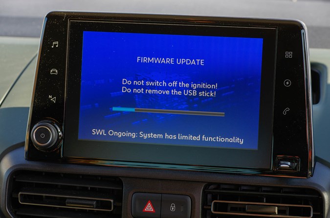 A firmware update screen on the Citroen e-Berlingo