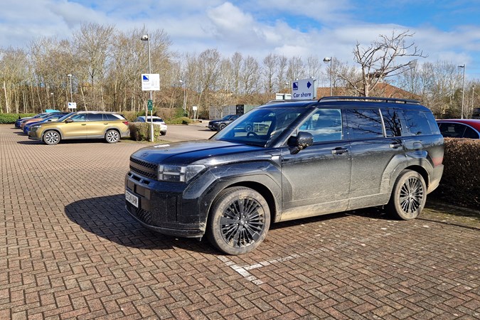 Hyundai Santa Fe - very dirty - with the Parkers Skoda Kodiaq long-term test car in the background