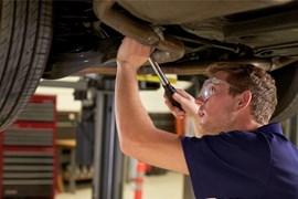 safety goggles underneath car