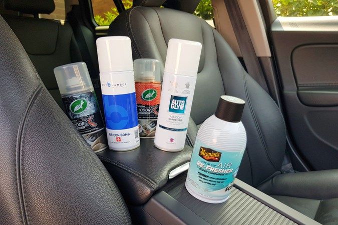Air con cleaners on car armrest