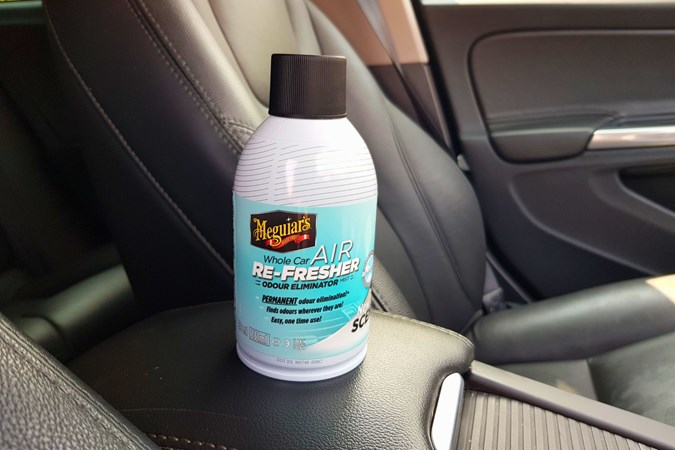 Meguiar"s air con refresher on car armrest