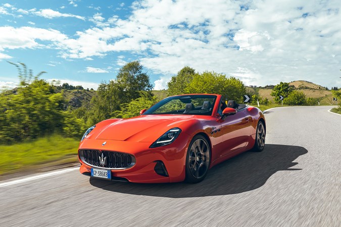 Maserati GranCabrio Folgore review: front three quarter driving, orange paint