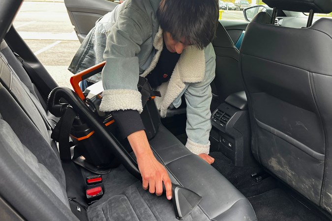 Aaron Hussain testing the Worx in the backseat of a Citroen