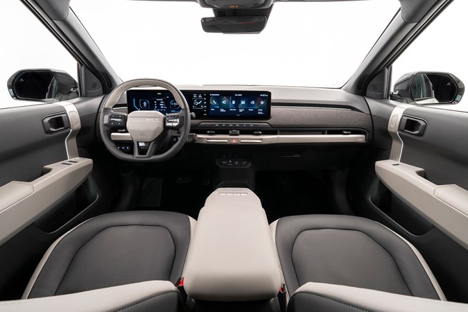 Kia EV3 (2024) reveal: dashboard and infotainment system, black and cream upholstery