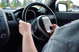 Using your phone at the wheel could cost you more than £500