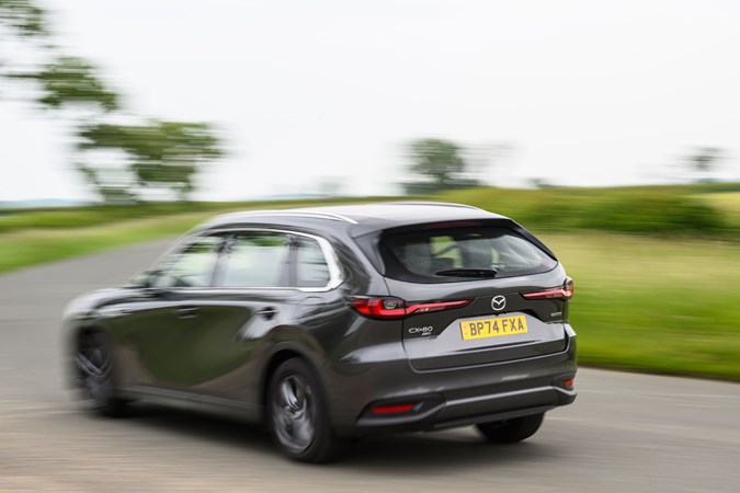 Mazda CX-80 long-term test - Exclusive-Line, Machine Grey, rear, cornering, blur