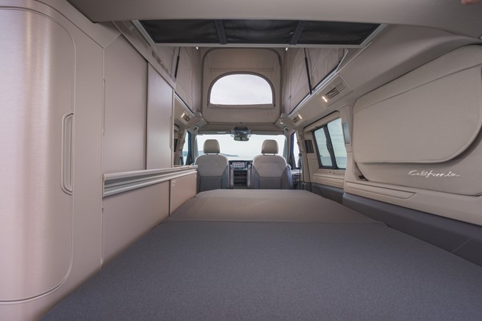 Close-up image of the Volkswagen California lower bed, viewed through the open boot