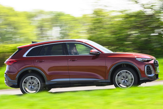 Audi Q5 review, red, driving, side profile | Parkers
