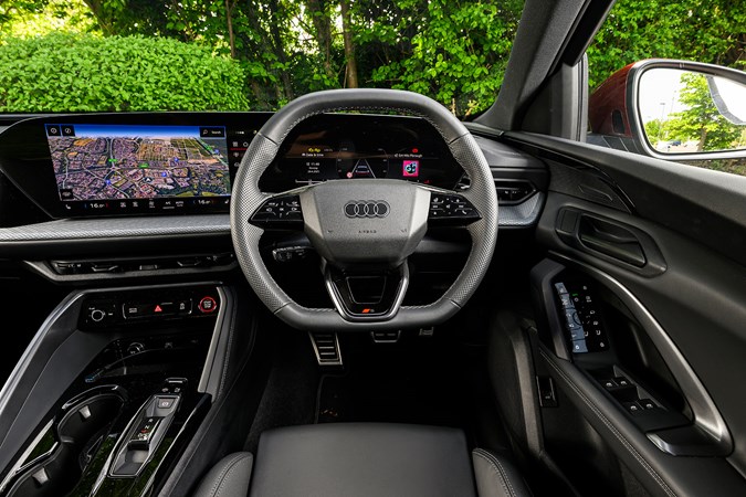 Audi Q5 review, interior, black, dashboard, steering wheel | Parkers