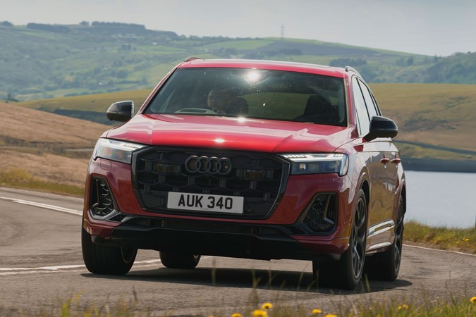 Audi Q7 (2025) review: front three quarter cornering, red paint, low angle