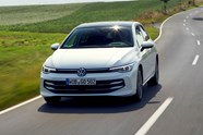 Volkswagen Golf eHybrid (2024) review: front three quarter driving, white paint