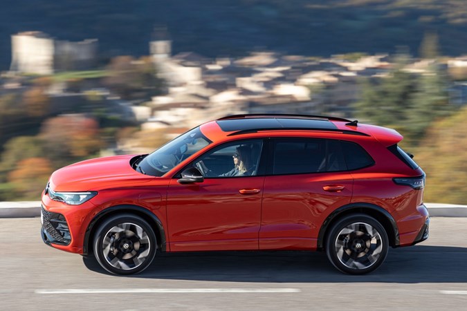 Volkswagen Tiguan eHybrid review - side, orange, driving