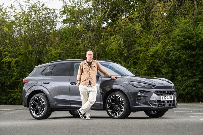 image of writer Graham King stood with his Cupra Terramar long-term test car