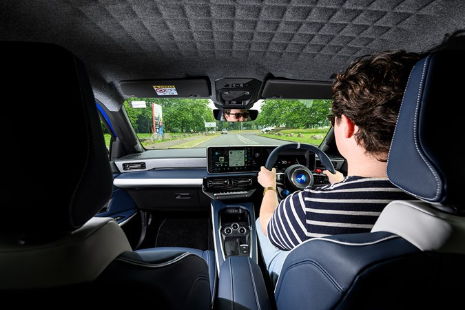 Alpine A290 review, blue, interior, Ryan Gilmore driving | Parkers