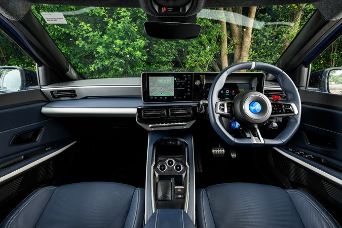 Alpine A290 review, interior, black, dashboard and steering wheel | Parkers