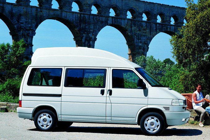 Image of Volkswagen T4 high roof camper van in white, side view