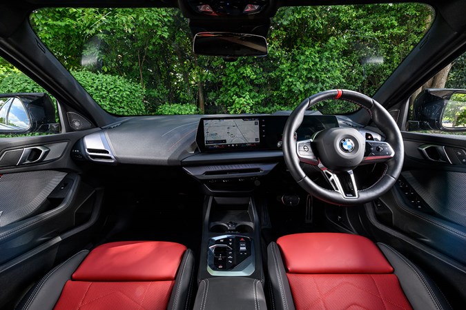 BMW M135 long-term test: dashboard and infotainment system, red leather