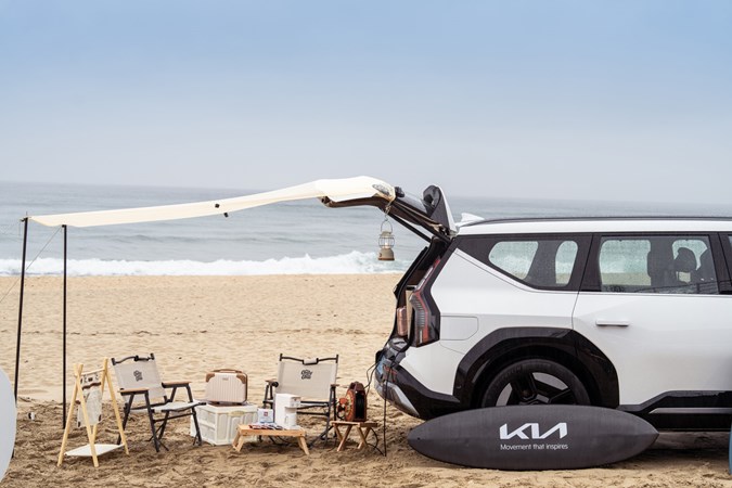 Image of a Kia EV9 powering a mini cabana