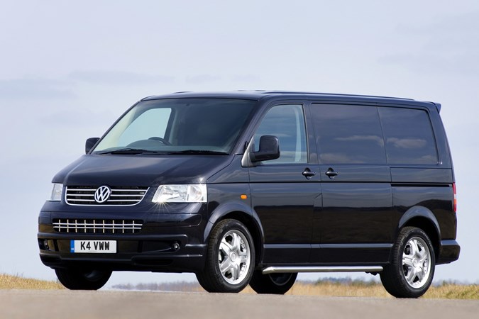 Image of the Volkswagen T5 Transporter Sportline panel van, in black, viewed from the left front corner