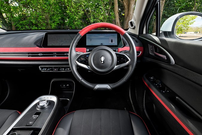 GWM Ora 03 review, interior, black, red, dashboard, steering wheel | Parkers
