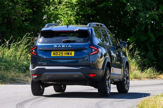 Dacia Bigster (2025) review: rear three quarter driving, blue paint