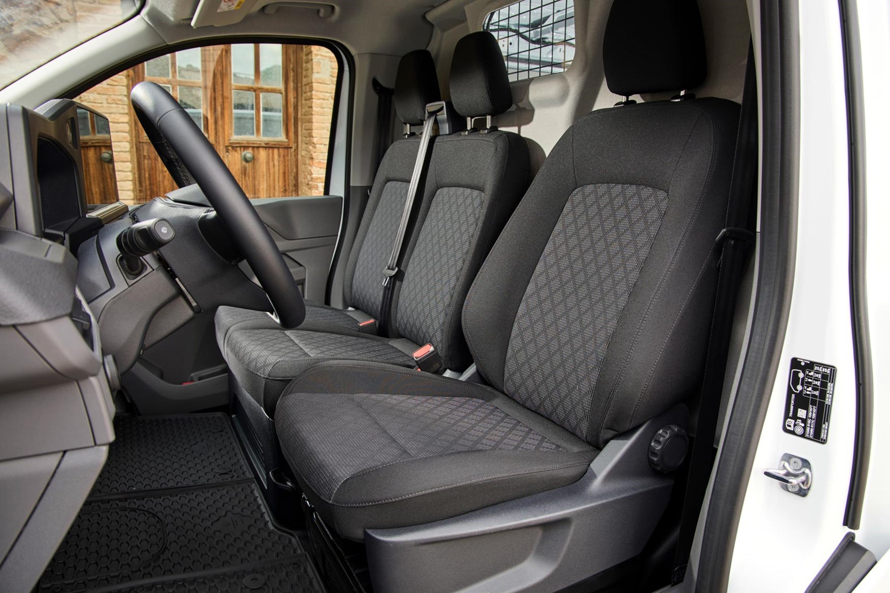 There is space for three adults in the VW Transporter's cabin.