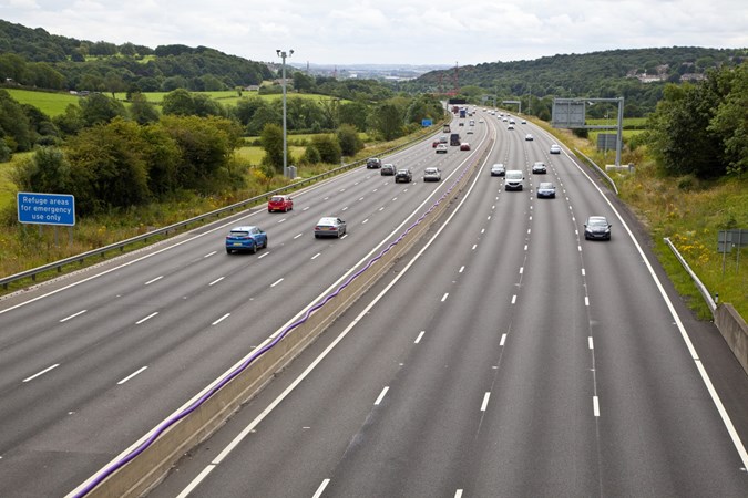 Image of light traffic on a UK motorway, shot from a bridge