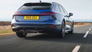 Audi A6 Avant review - rear, blue, driving, low