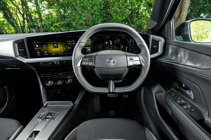 Vauxhall Mokka Electric review, interior, black, dashboard, steering wheel | Parkers