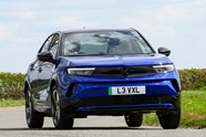 Vauxhall Mokka Electric review, driving, blue, front three quarters | Parkers