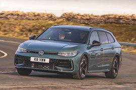 The Volkswagen Passat is our leasing pick of the week, turquoise, driving, cornering, front three quarters | Parkers