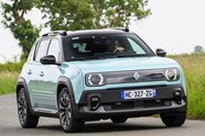Renault 4 E-Tech review, blue, moving, front three quarters | Parkers