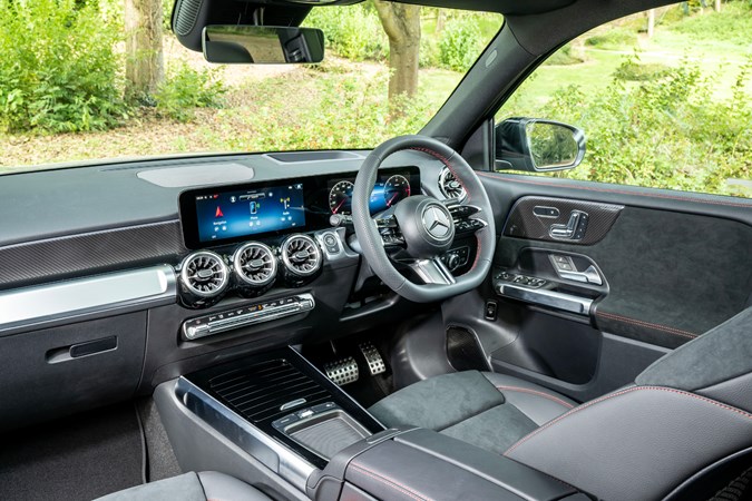 Mercedes GLB (2023) review: dashboard, infotainment system and front seats, black leather upholstery