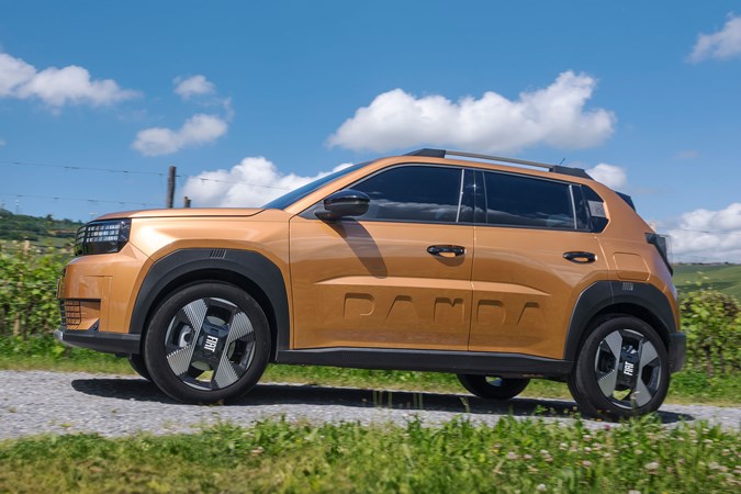 Fiat Grande Panda Hybrid (2025) review: side view driving, bronze paint