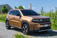 Fiat Grande Panda Hybrid (2025) review: front three quarter driving, low angle, bronze paint