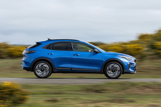 Kia XCeed review - facelift, blue, side, driving
