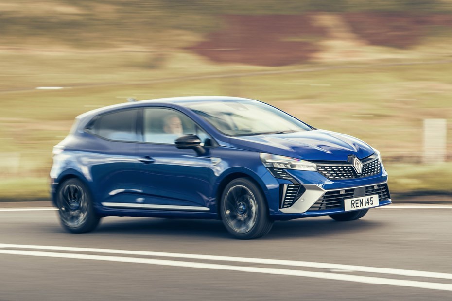 Renault Clio (2023) review: front three quarter cornering, motion blur, country lane, blue paint