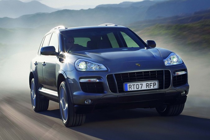 Porsche Cayenne, front three quarters, silver, driving, dust | Parkers