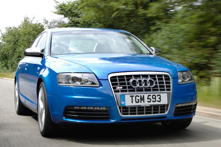 The Audi S6 V10, blue, front three-quarters, driving