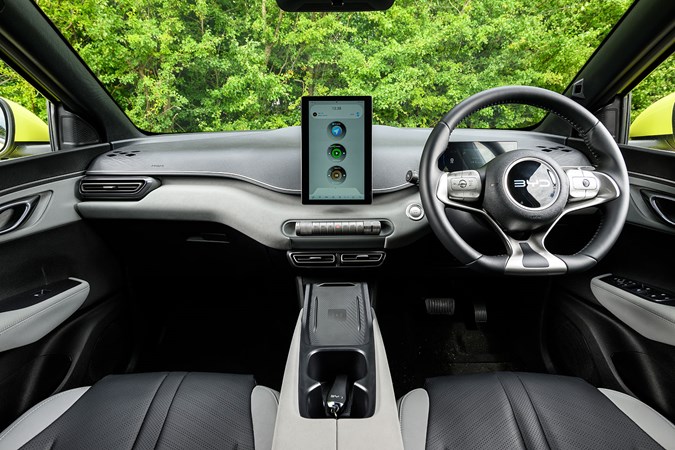 BYD Dolphin Surf (2025) review: dashboard and infotainment system, black and grey faux leather upholstery