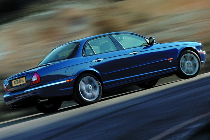 Jaguar XJR, blue, moving, exterior, rear three quarters | Parkers