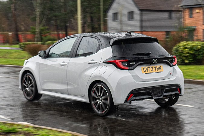 Toyota Yaris, white, driving, rear three-quarters | Parkers