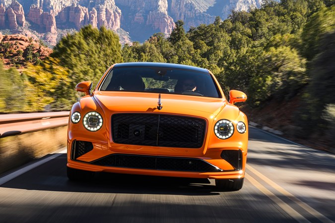 Bentley Flying Spur review - V8 plug-in hybrid, Mandarin orange, dead-on front, driving