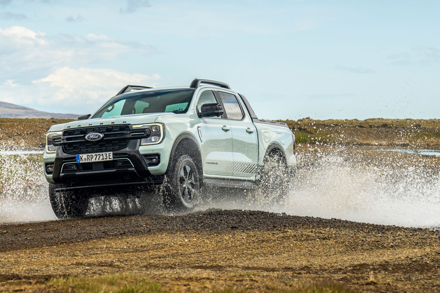 Ford Ranger Plug-in Hybrid review on Parkers - Stormtrak, front, grey, off-road
