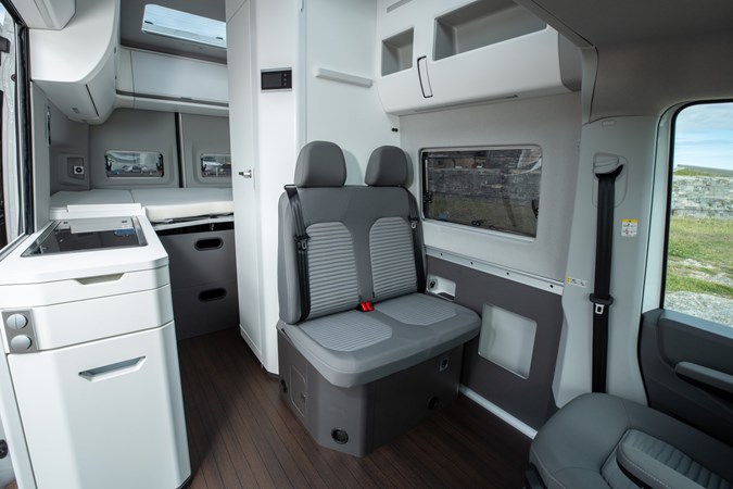 Image of the Volkswagen Grand California interior, looking back from the lounge to the bedroom