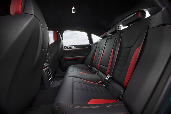 BMW i4 (2024) review: rear seats, black and red leather upholstery