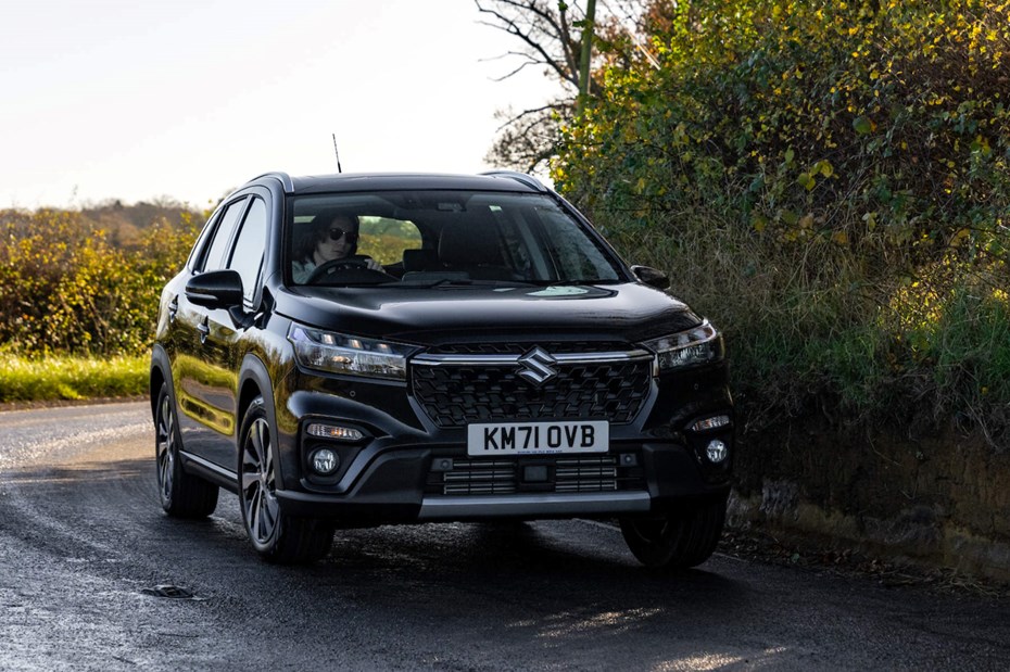 Suzuki S-Cross review 2022 - front cornering shot, blue car, autumnal road