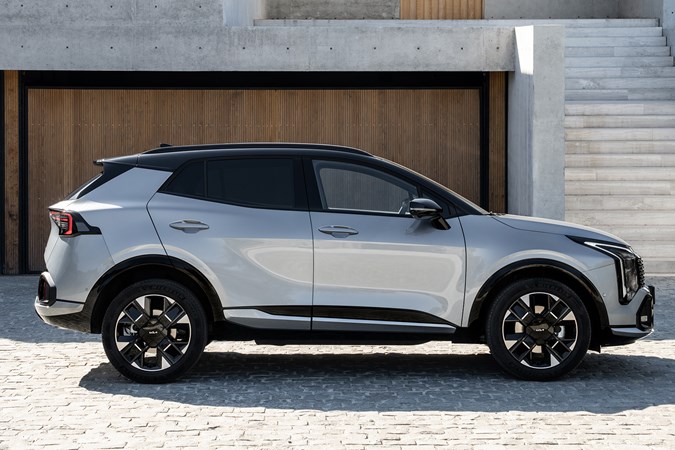 Kia Sportage review, silver, static, side (2025)