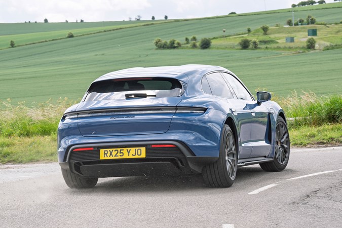 2022 Porsche Taycan Sport Turismo rear cornering Porsche Taycan Sport Turismo (2025) review: rear three quarter cornering, blue paint