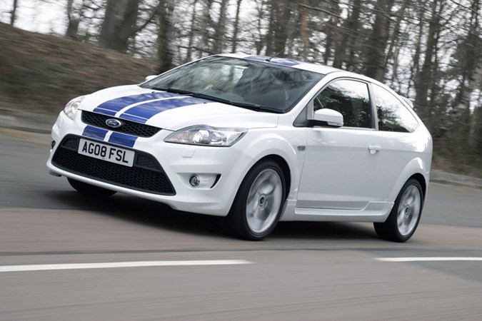 Image of a white 2008 Ford Focus ST, viewed from the front left corner while driving